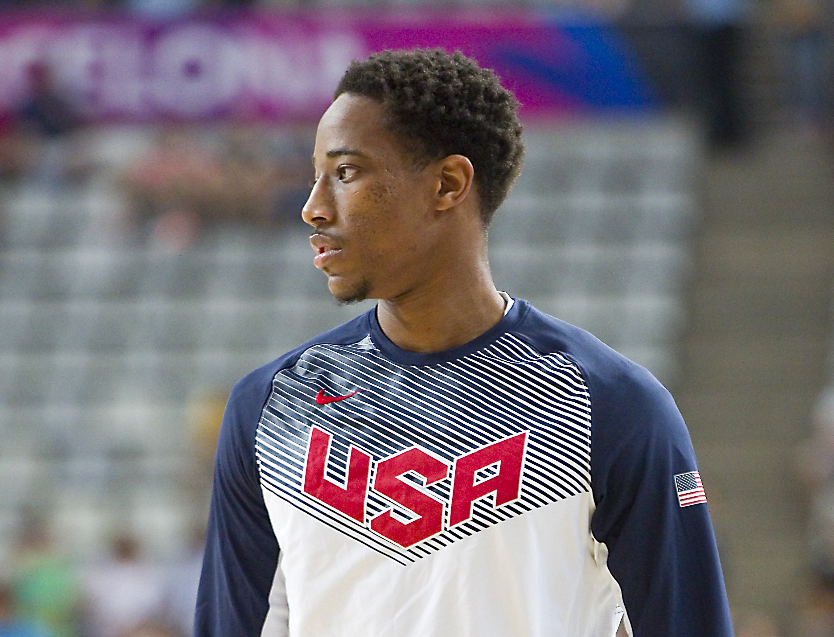 Head and shoulder shot of Demar, looking over right shoulder